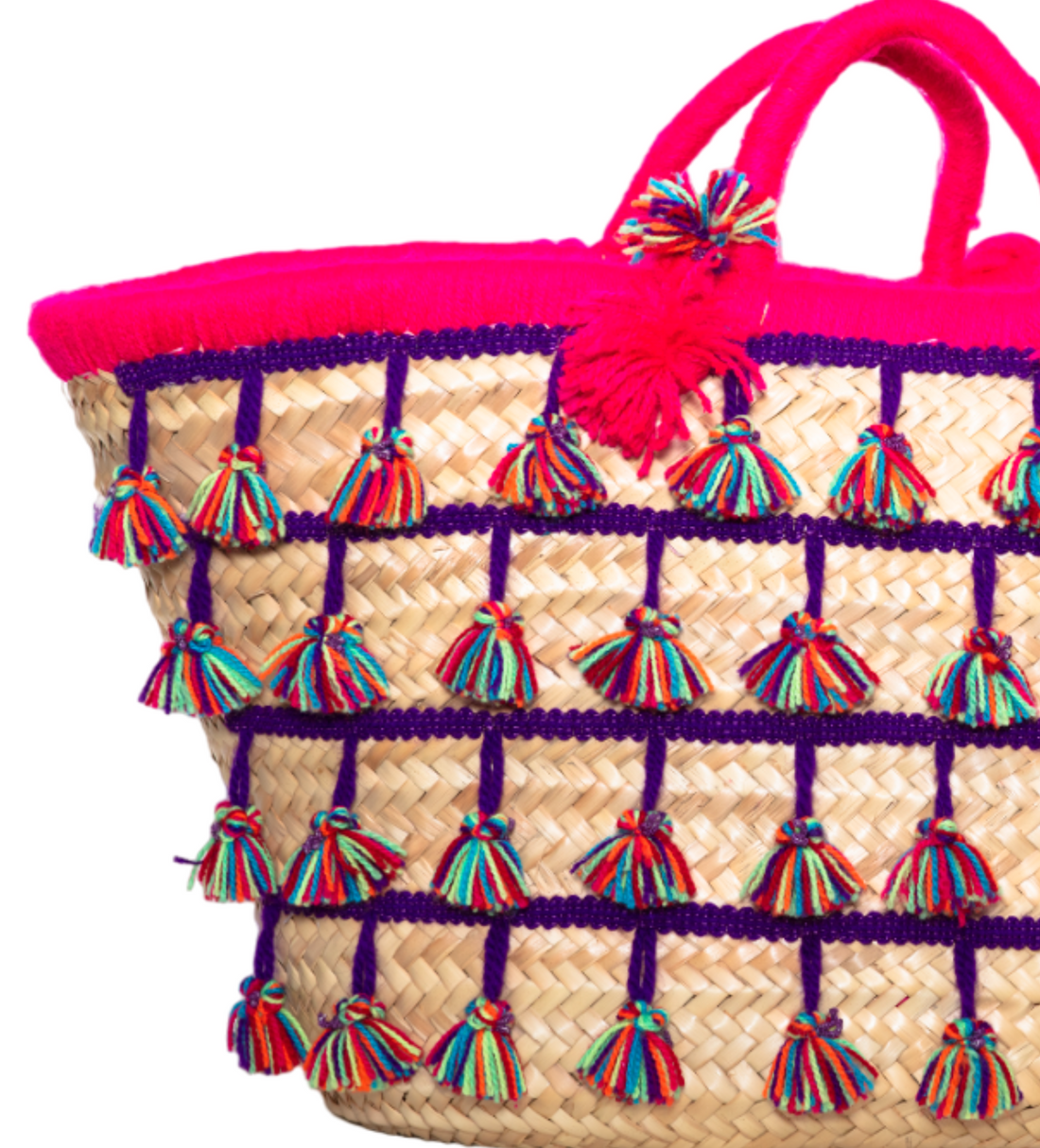 Borsa mare in rafia con nappine fucsia