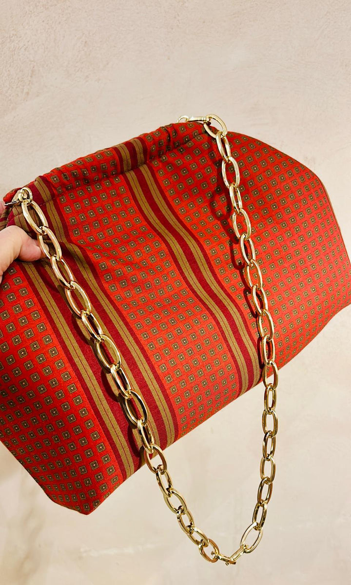 CLUTCH ROSSA RIGHE POIS